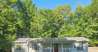 Lake House with easy water access, limited water view, sitting on 4 acres.