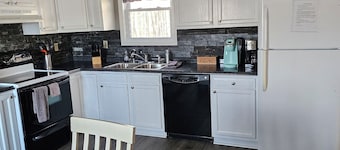 Lake House with easy water access, limited water view, sitting on 4 acres.