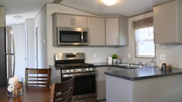 Standard Cottage, Multiple Bedrooms | Private kitchen | Full-sized fridge, microwave, oven, stovetop