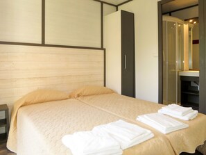 2 quartos, berço de viagem, Wi-Fi de cortesia, roupa de cama