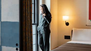 Premium bedding, down comforters, minibar, in-room safe