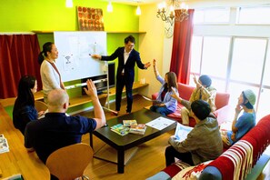 Max Occupancy 12 People, Non Smoking | Living area | Flat-screen TV