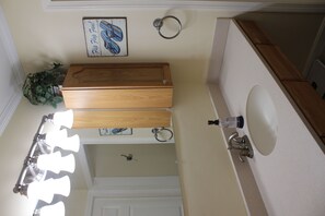 Bathtub, hair dryer, towels, soap