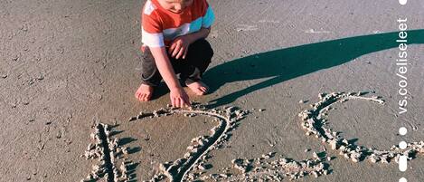 En la playa y toallas de playa