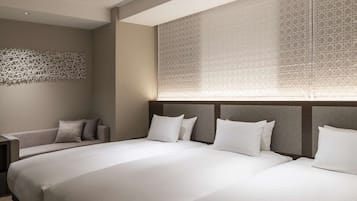 Family Triple Room, Non Smoking (Children breakfast fee paid onsite) | Down duvets, blackout curtains, free WiFi, bed sheets