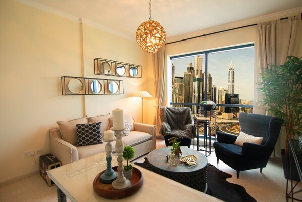 Deluxe Apartment | Living area | Flat-screen TV - Lux BnB I X1 Tower I Golf Course & Sea Views (Dubai)
