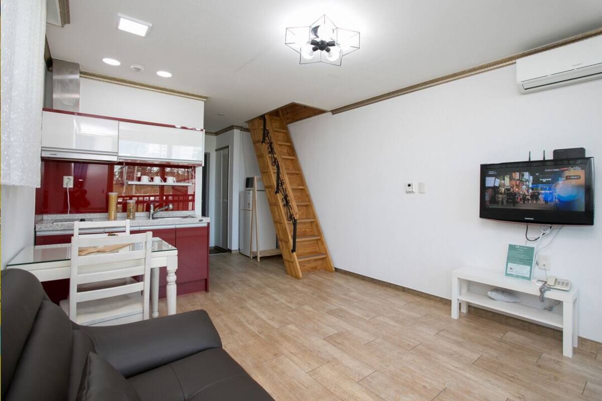Loft (Solhyang 202) | Living area | Flat-screen TV