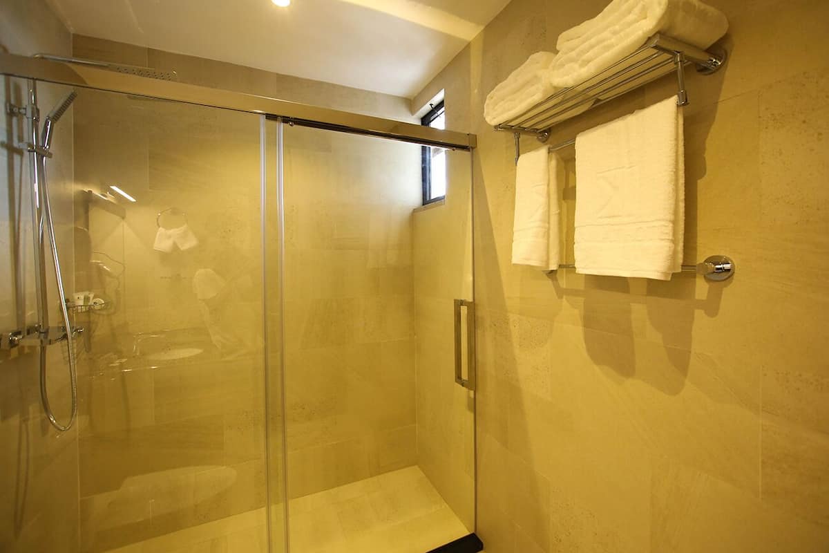 rainfall showerhead, designer toiletries, hair dryer, bathrobes