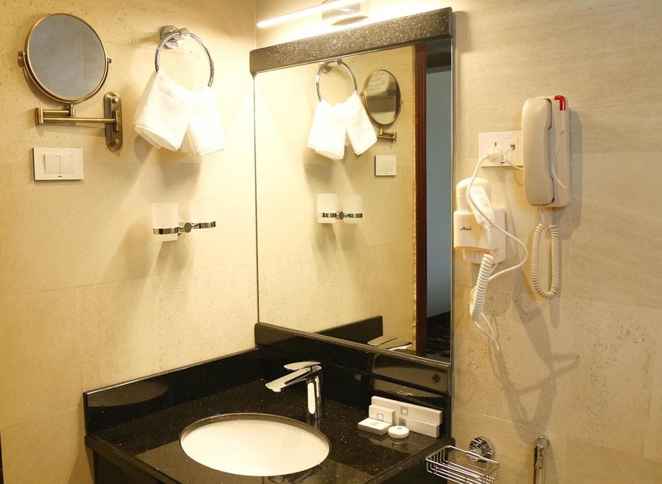 junior suite | bathroom | rainfall showerhead, designer toiletries, hair dryer, bathrobes