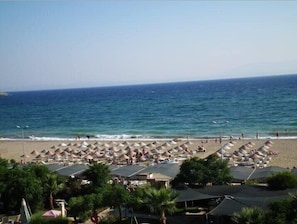 Private beach, free beach shuttle, beach bar
