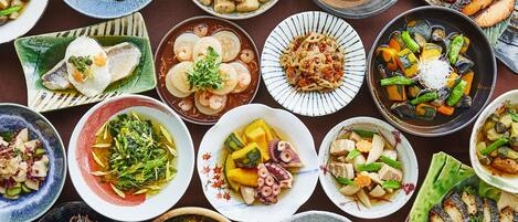 A variety of dishes arranged on a table.