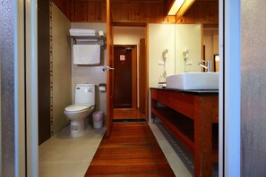 Quadruple Room | Bathroom | Hair dryer, slippers, towels, shampoo