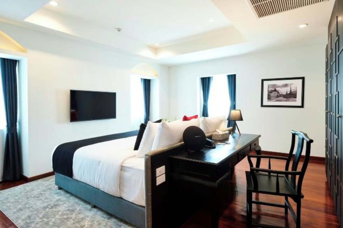 Ropa de cama de alta calidad, minibar, caja fuerte y escritorio
