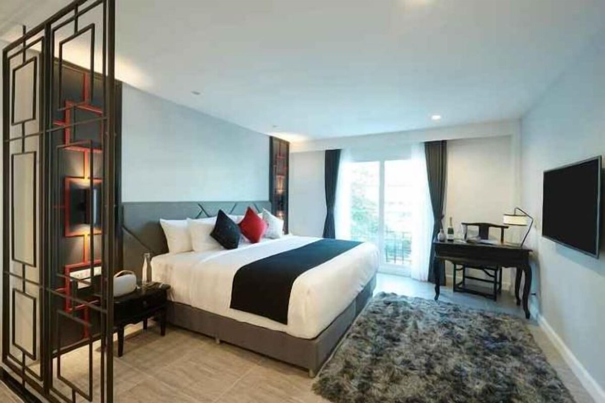 Ropa de cama de alta calidad, minibar, caja fuerte y escritorio