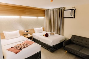 Desk, iron/ironing board, free WiFi, bed sheets - L Meridian Suites (Zamboanga)