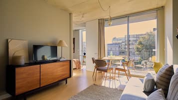 Family Apartment, 2 Bedrooms, Balcony | Living area | 40-inch Smart TV with satellite channels, TV
