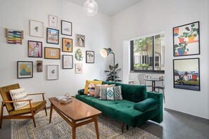 Apartment, 1 Bedroom | Living area | Flat-screen TV