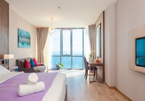 Deluxe-Apartment | Wohnzimmer | 40-Zoll-Flachbildfernseher mit Kabelempfang, LCD-Fernseher