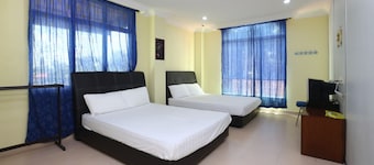 SPOT ON 89857 Azra Inn Rumah Tumpangan