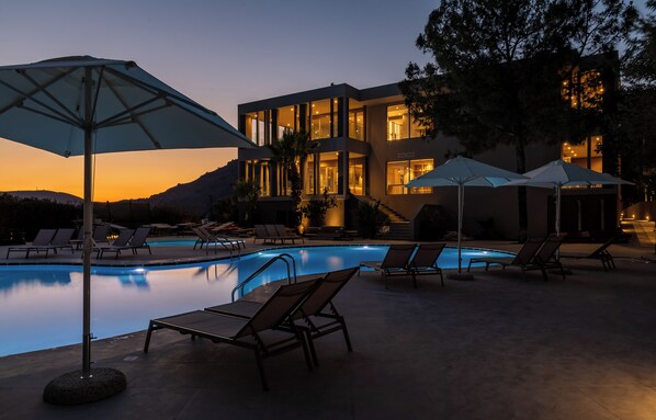 Seasonal outdoor pool, pool umbrellas, pool loungers