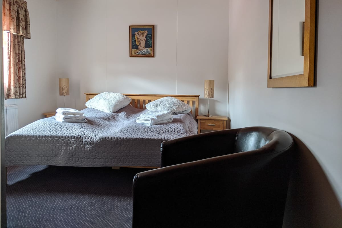 Desk, laptop workspace, free WiFi, bed sheets