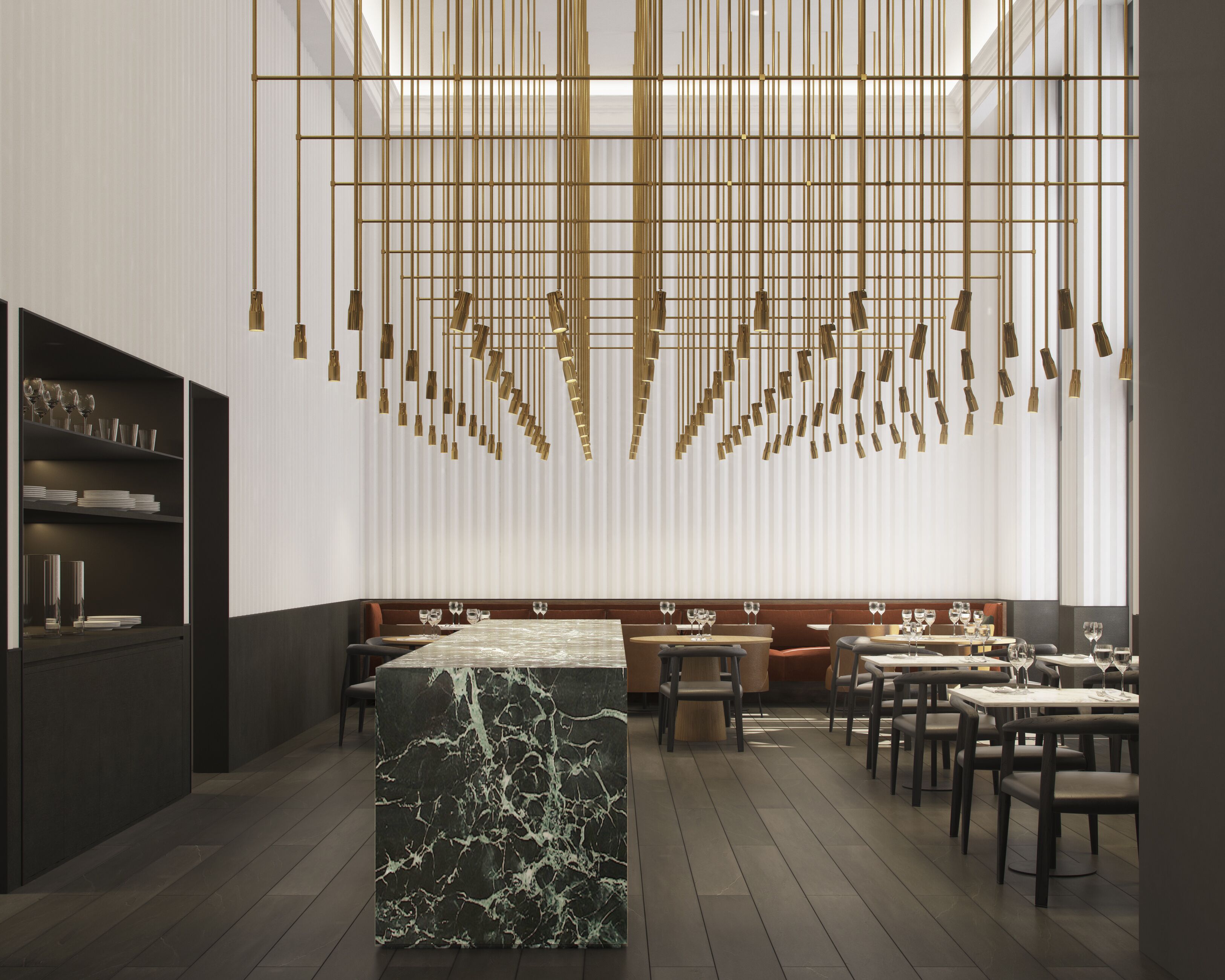 Un interior de restaurante moderno con barra de mármol, detalles dorados colgantes y un diseño limpio y contemporáneo.