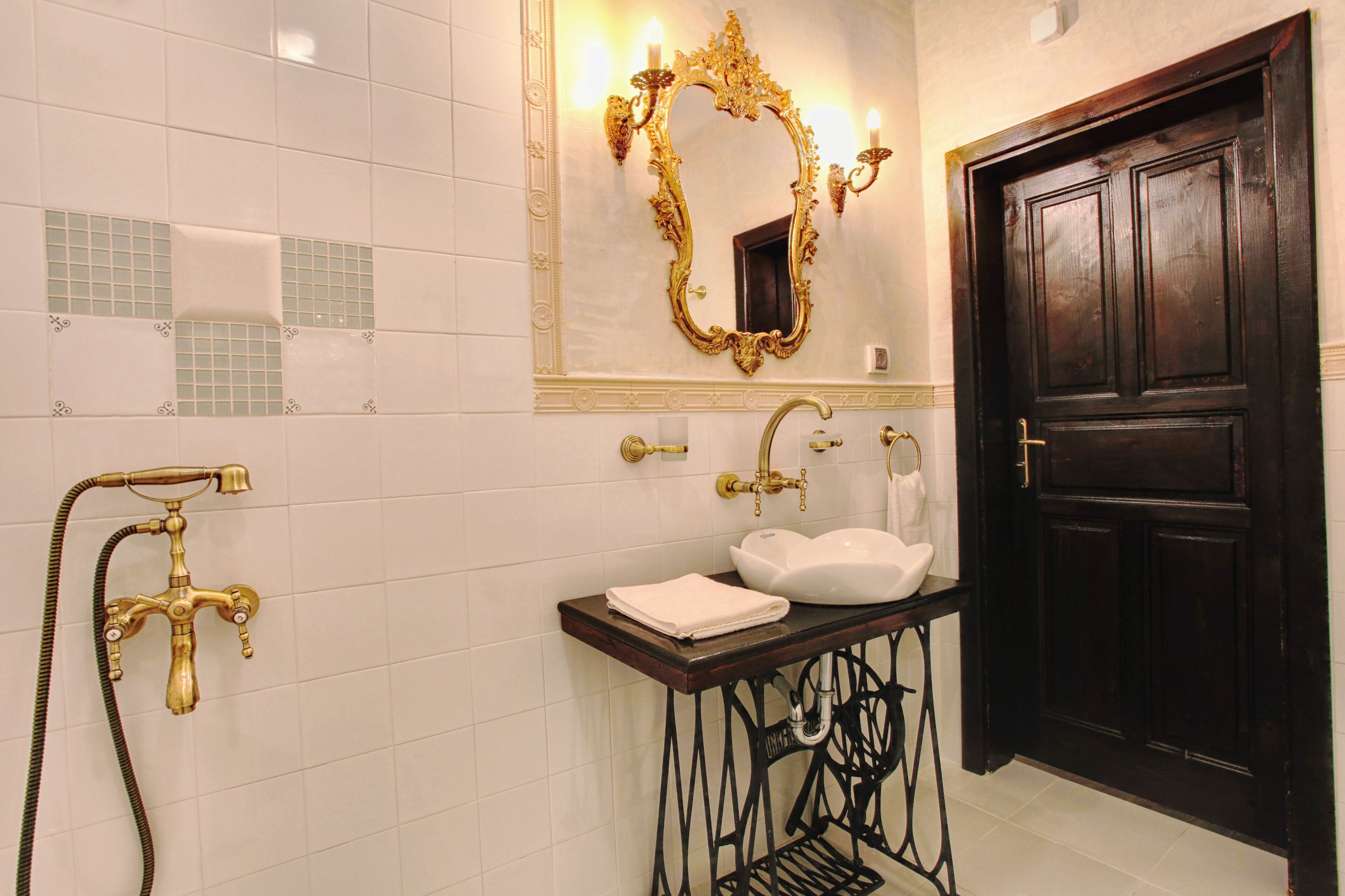 deluxe triple room | bathroom | shower, designer toiletries, hair dryer, slippers