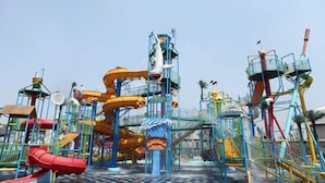 A water park with multiple slides and play structures. - Semeru Hostel Malang - Adults Only (Malang)
