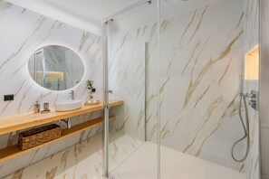 Bathtub, hair dryer, towels