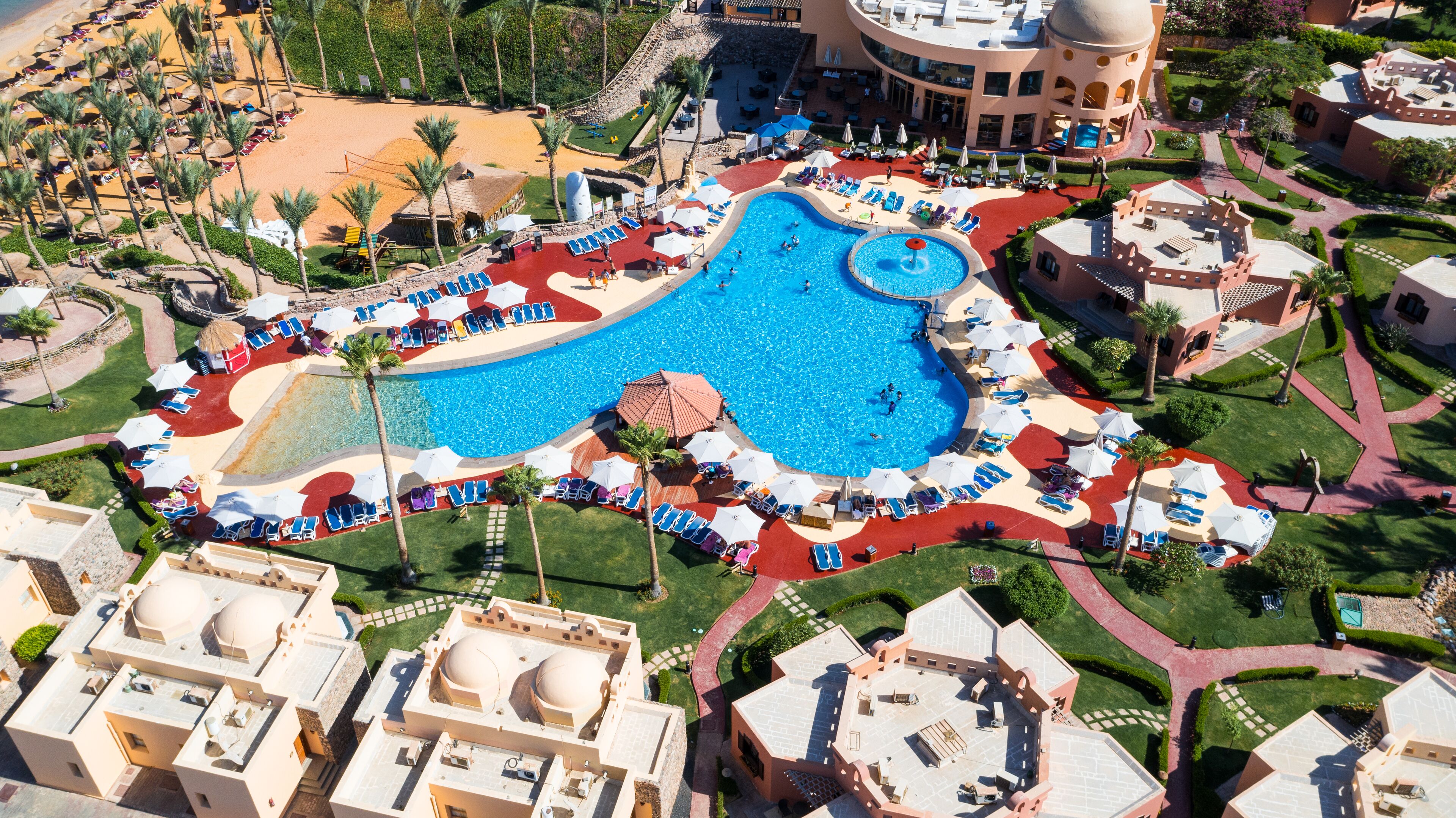 2 outdoor pools, pool umbrellas, pool loungers