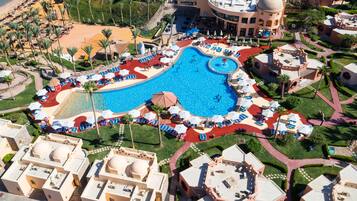 2 outdoor pools, pool umbrellas, pool loungers