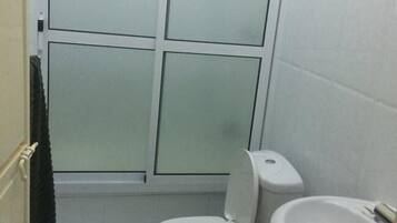 Shower, free toiletries, towels, soap
