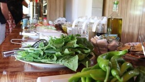 A buffet table with various food items and condiments. - Plaj Hotel (Kemer)