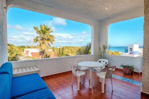 Outdoor dining - Beautiful condo with ocean view, shared pools and amazing views! (Akumal)
