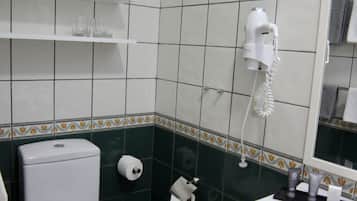 Shower, free toiletries, hair dryer, towels