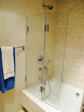 Bathtub, hair dryer, towels