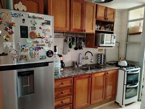 Fridge, microwave, oven, dishwasher