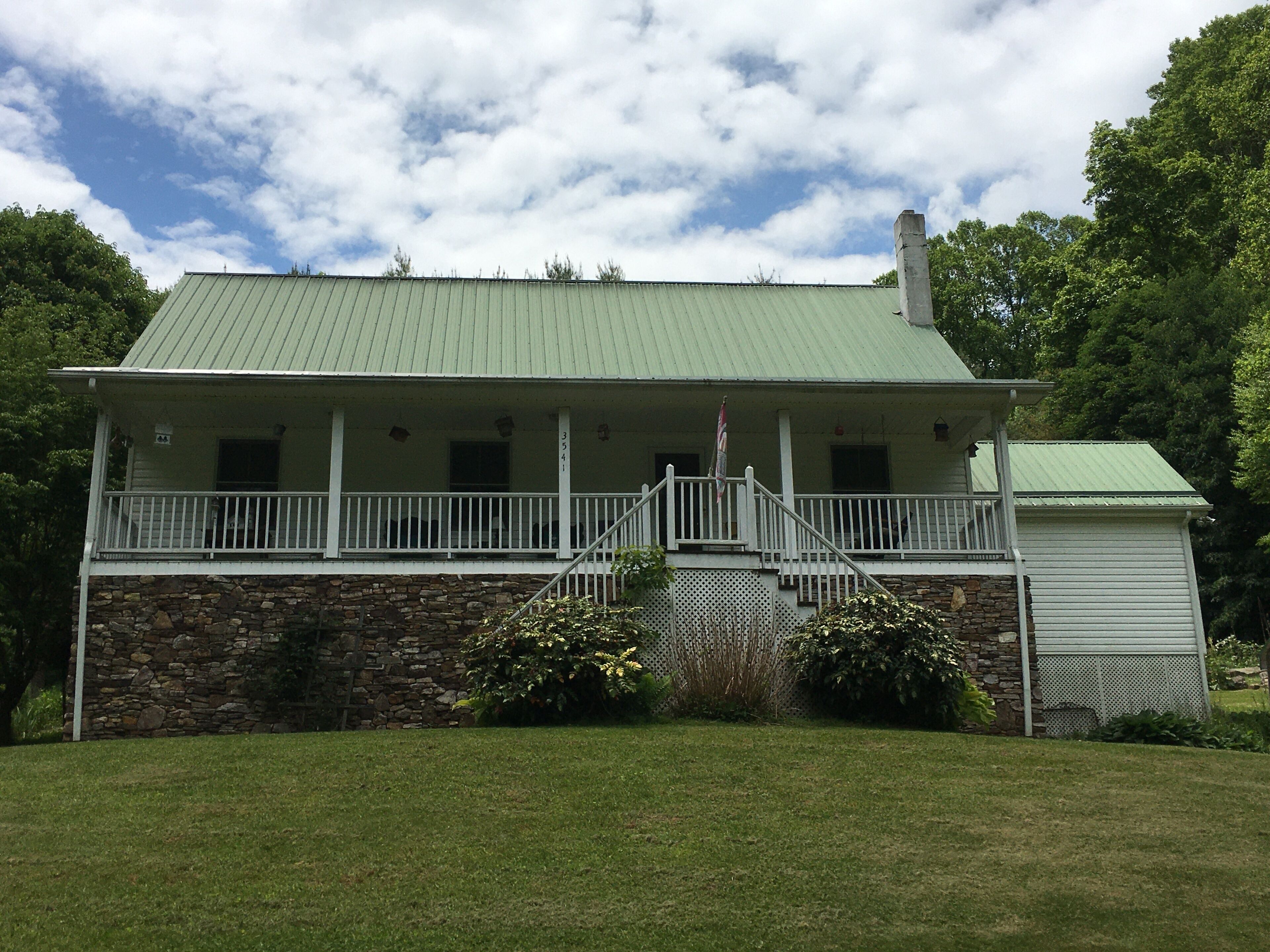 The Springhouse on Mill Creek,  2-story farmhouse near West Jefferson, NC