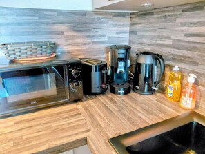 Microwave, oven, coffee/tea maker, toaster