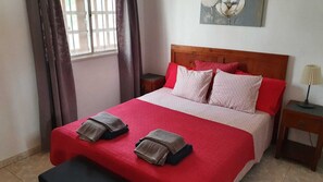 4 bedrooms, in-room safe, iron/ironing board, travel cot