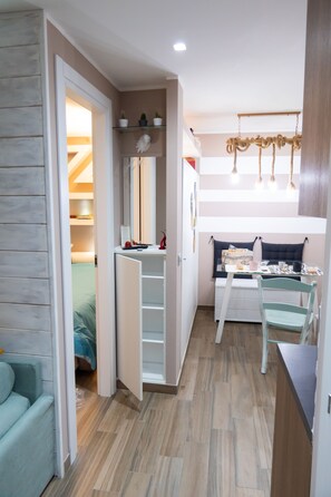 1 quarto, cofres nos quartos, ferros/tábuas de passar roupa