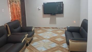 Superior Apartment | Living area | TV