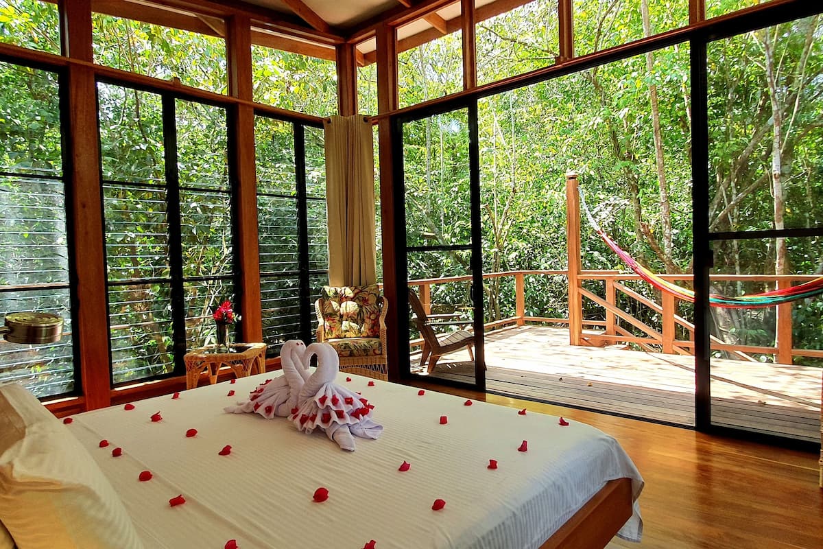 superior tree house, 1 king bed, garden view (gumbo limbo & guanacaste) | 2 bedrooms, pillow-top beds, in-room safe, individually decorated