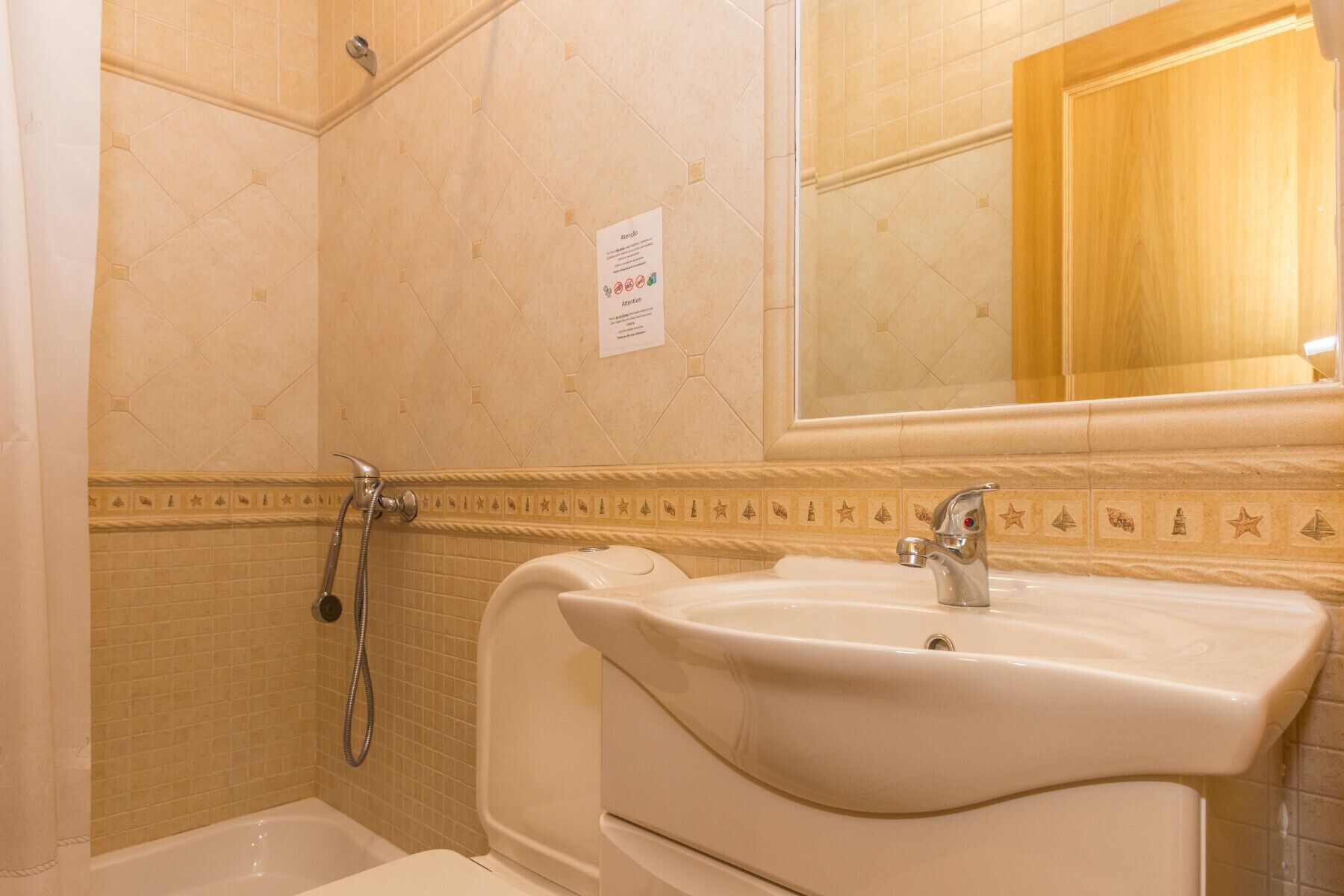 Bathtub, hair dryer, towels