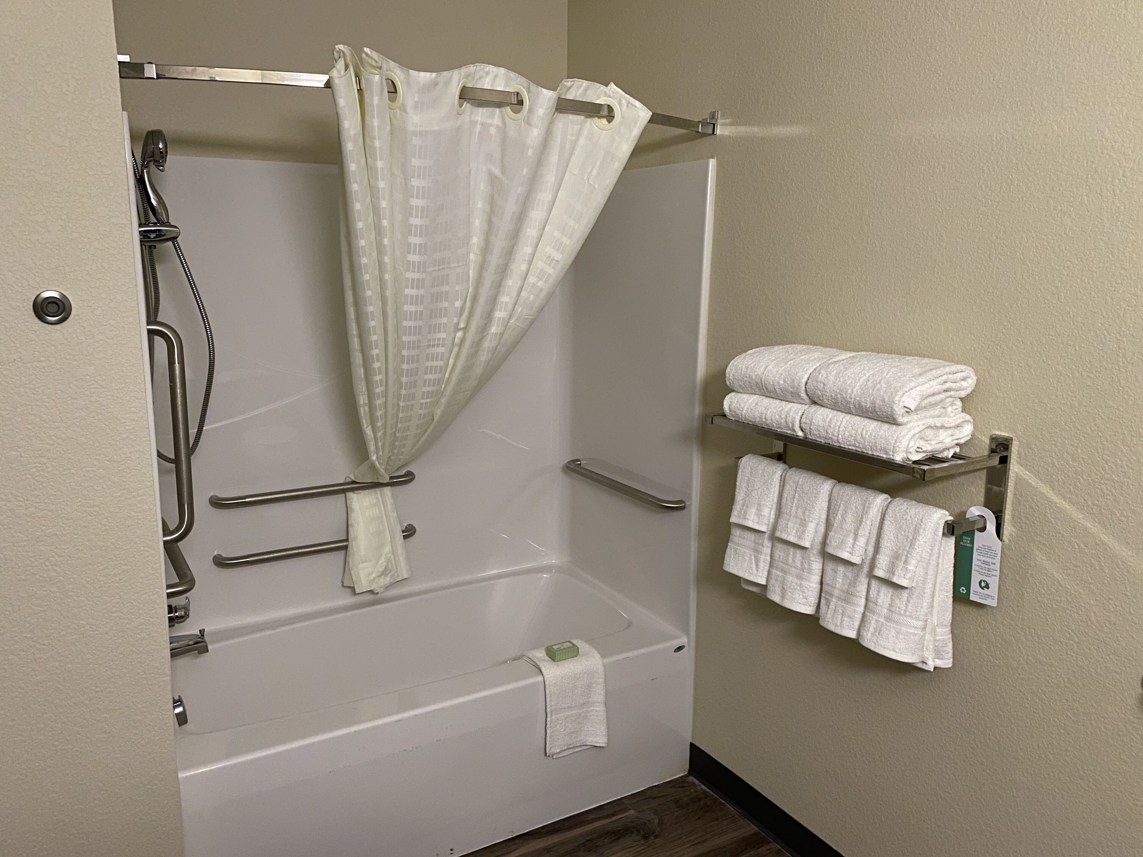 combined shower/bathtub, free toiletries, hair dryer, towels