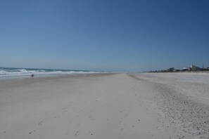 On the beach, sun loungers