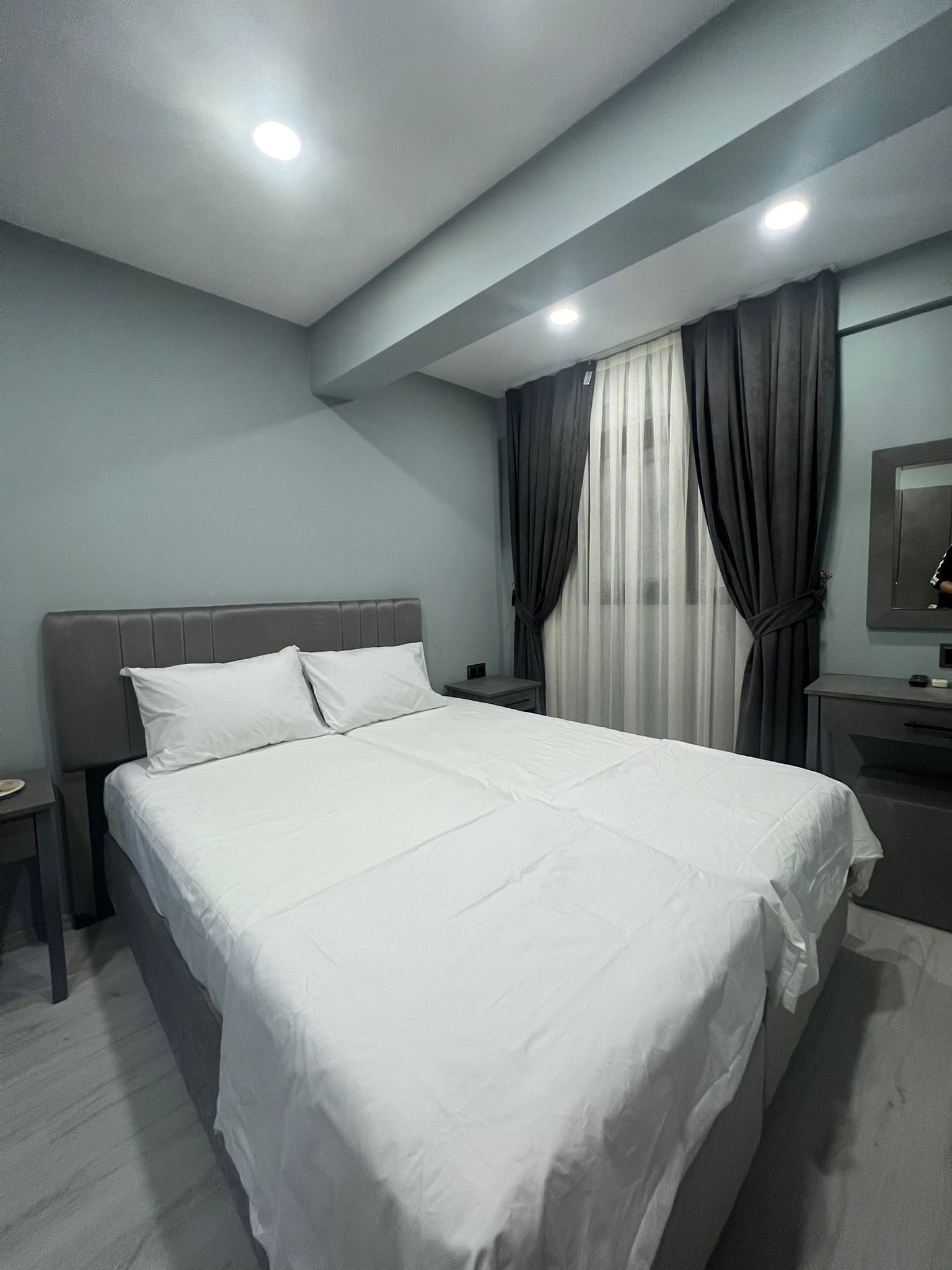 Economy Room | Bathroom | Shower, rainfall showerhead, hair dryer, slippers