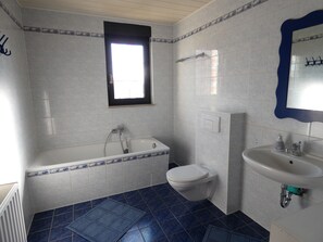Eco-friendly toiletries, hair dryer, towels, soap