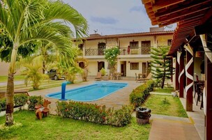 Indoor pool, open 8:00 AM to 10:00 PM, pool umbrellas, sun loungers