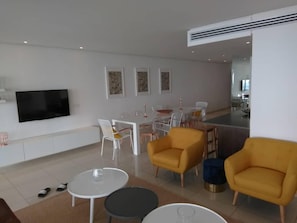 Apartment, 2 Bedrooms | Living area | 32-inch flat-screen TV with satellite channels, TV